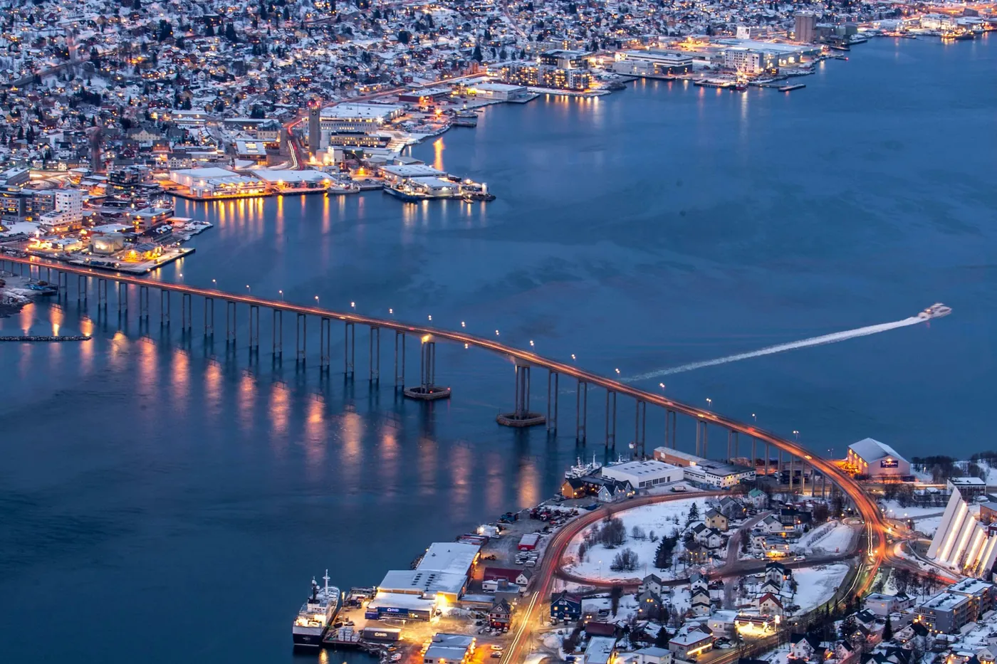View from Fjellheisen at night over the lit-up bridge and city